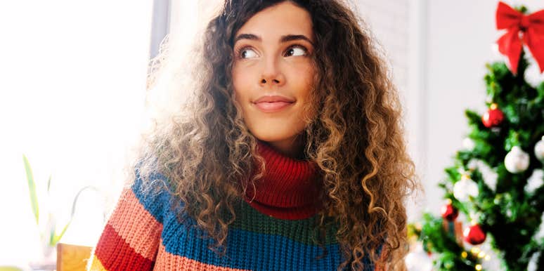 calm unbothered woman using mental tricks to stay centered while surviving the holidays with her toxic family.