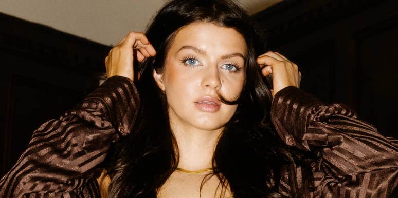 hopeful person opening their heart to connection, illustrating the simple ways people align themselves to call in a true soulmate