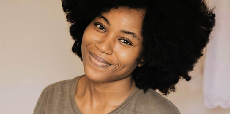 warm kindhearted person with an sweet smile, illustrating the simple daily habits that come naturally to truly generous people