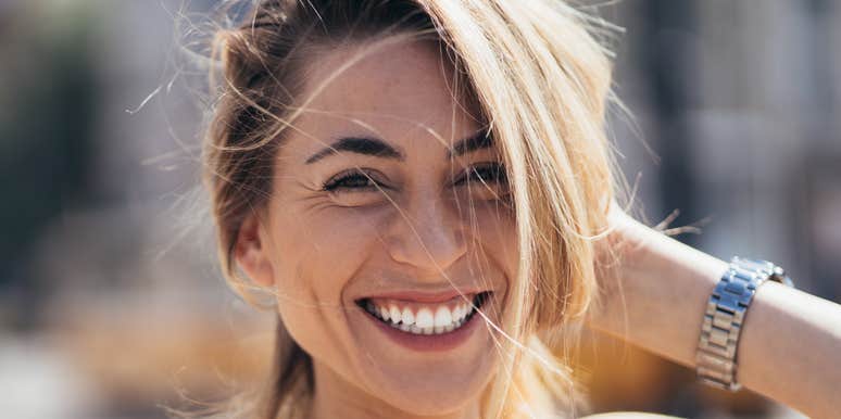 Woman subtly flirts.