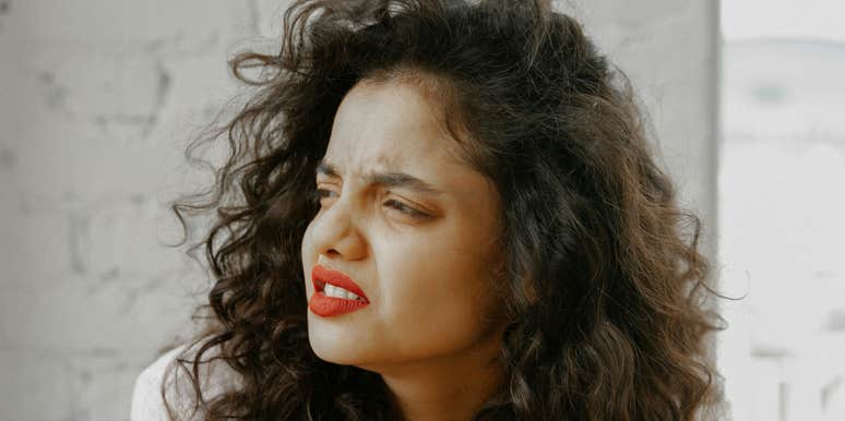 Woman notices gross behavior.