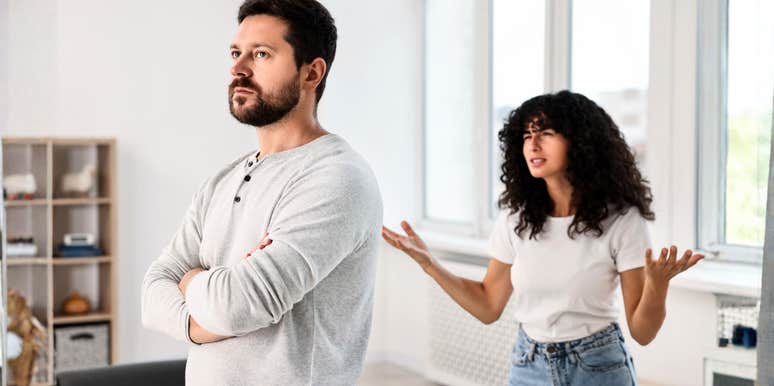 Emotional couple arguing at home showing the facial expression that predicts divorce with 93.6% accuracy.