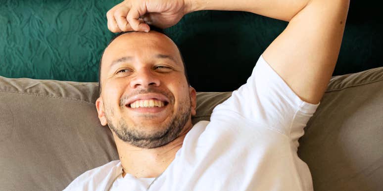 Confident smiling guy showing the tricks guys who never get stuck in the friend zone