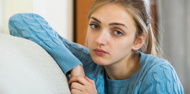 very miserable young woman with unhealthy habits