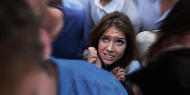 woman who feels daunted by being around a lot of people