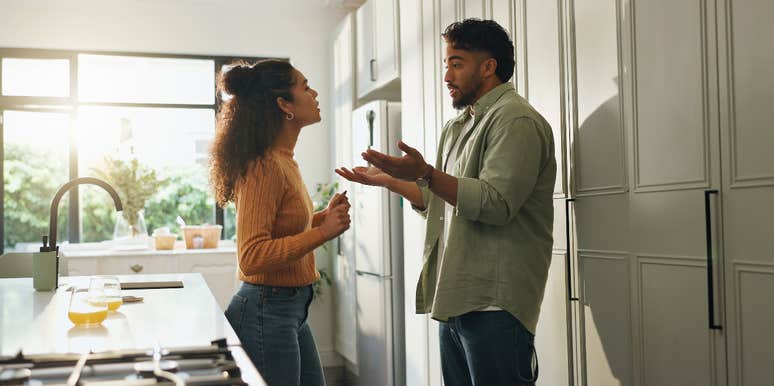 couple fighting in kitchen
