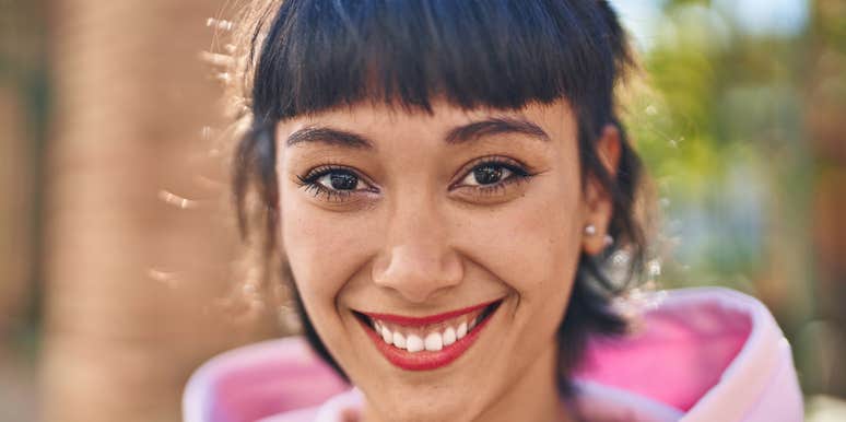 truly nice woman smiling outside