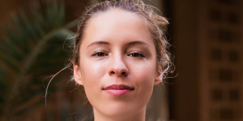 Woman is stoic after a breakup.