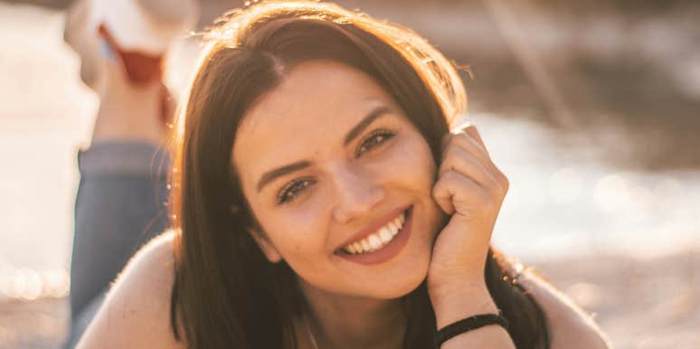 Woman is unbothered and happy.