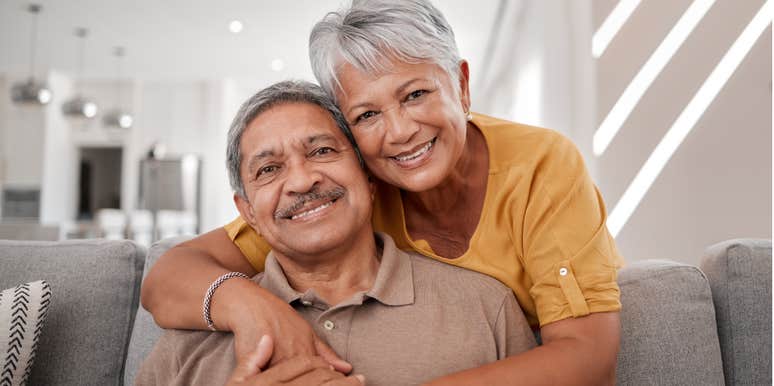 loving couple hugging on the couch