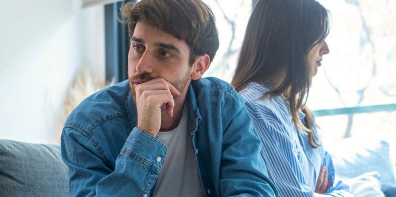 sad couple turned away from each other falling out of love