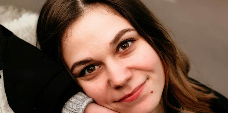 Woman smiling, ready to fall in love again after divorce