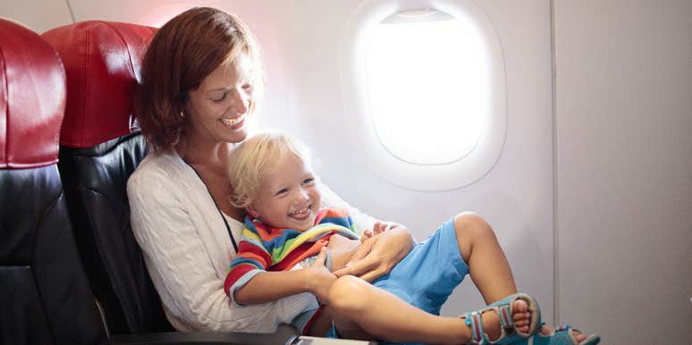 mom on a long flight with her toddler