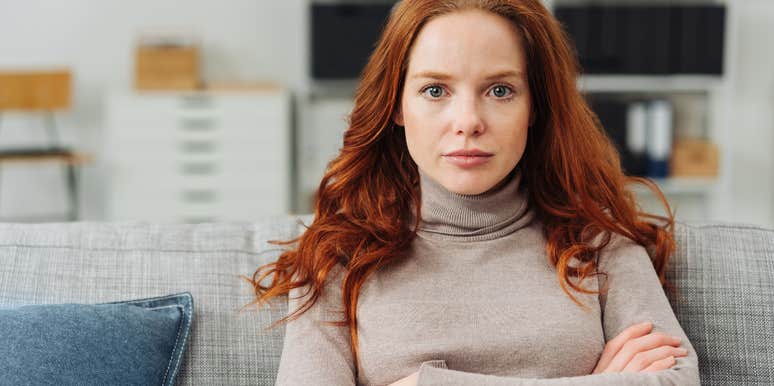 woman who seems nice is but is actually low class crossing her arms