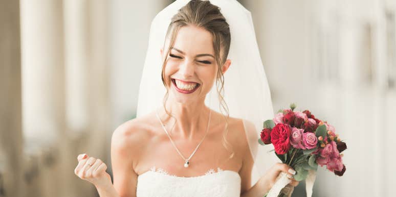 Student Takes Bridal Photos To Mark The First Time Holding Her PhD Dissertation