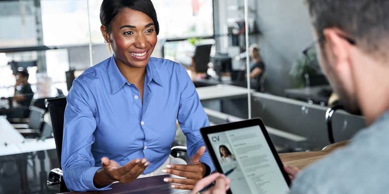 woman talking to hiring manager at job interview