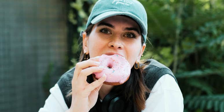 Young mom taking a quiet moment in public, reflecting on the normal chaos of parenting.