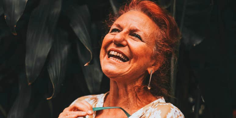 woman laughing trait more attractive physical looks