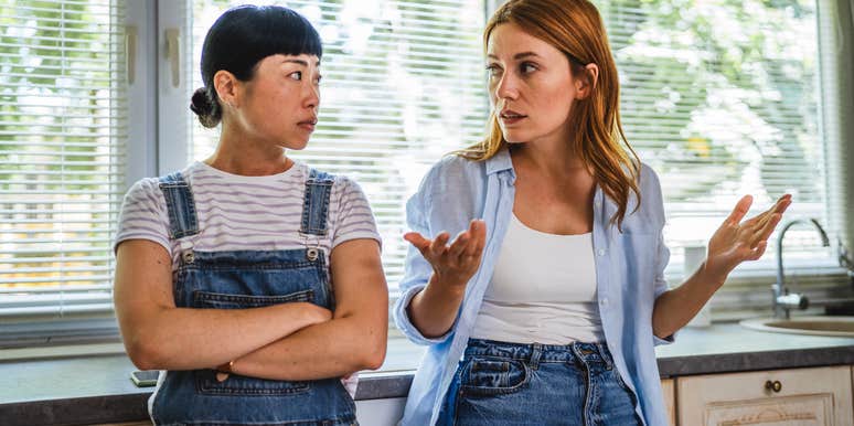 bride arguing with her friend about her destination wedding