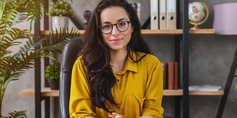woman sitting at desk for interview