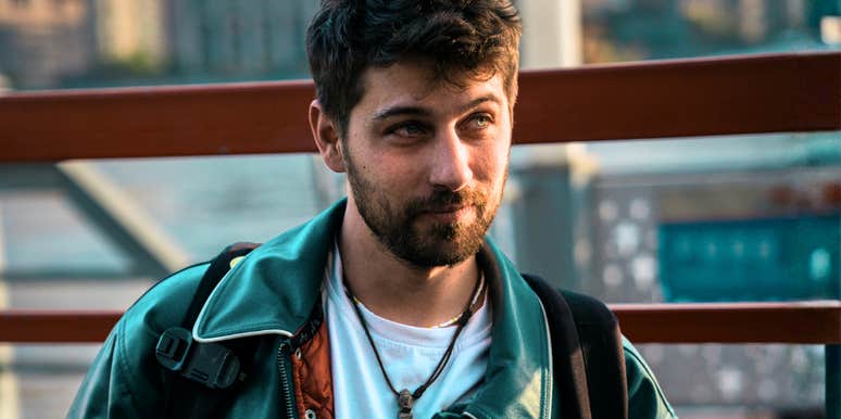 Man standing outdoors, facing forward but looking off to the side, illustrating missing key traits that chemistry alone can’t fix in a relationship