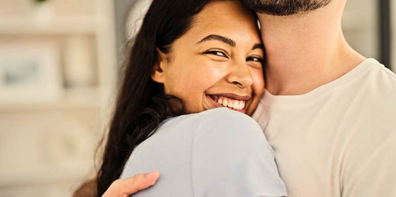 Woman who is truly in love with the man she's hugging