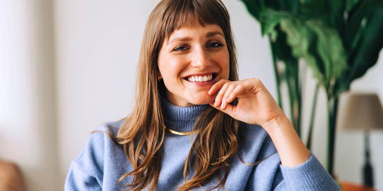 smiling successful woman raised by good parents