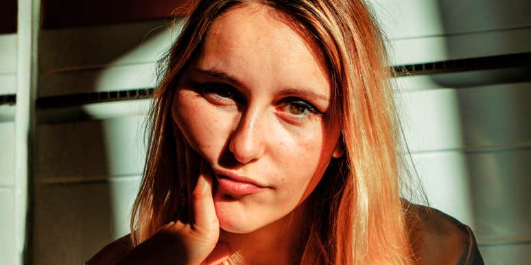 woman quietly evaluating her security in relationship