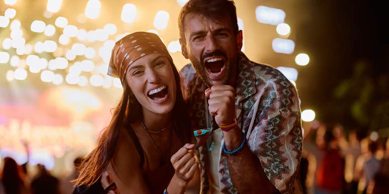 couple singing along at concert