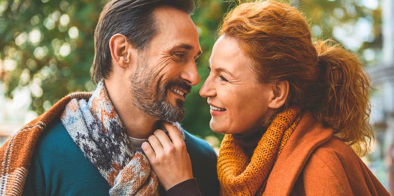 man deep in love with his wife staring at her smiling