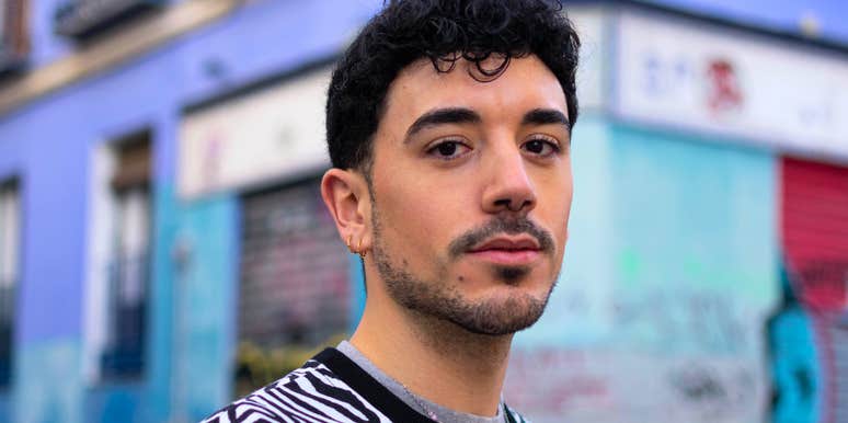 young gen z man standing outside