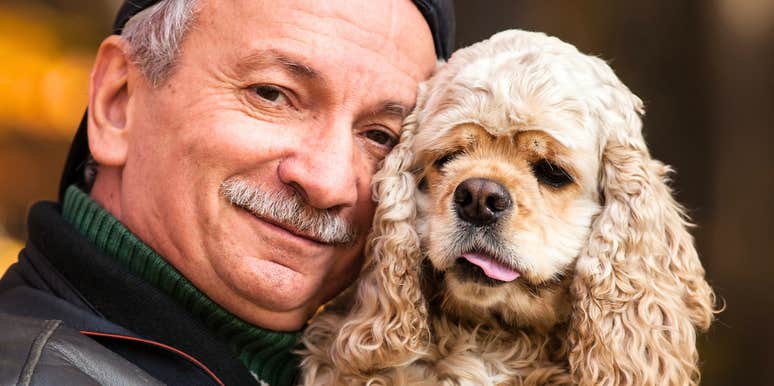 stress free man spending time dog