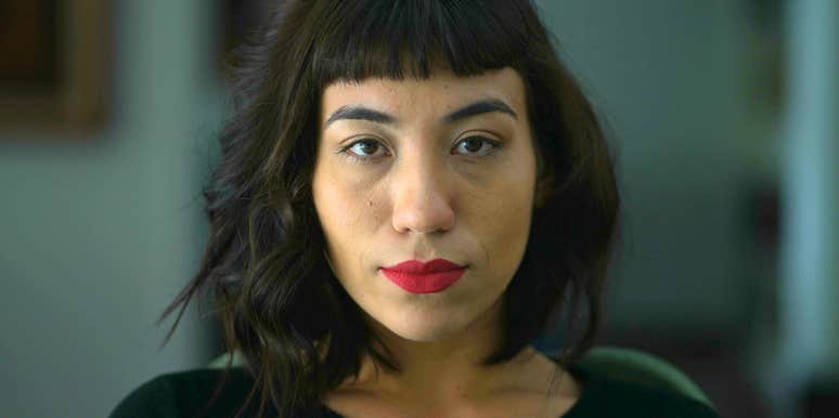 serious woman who doesn't trust anyone