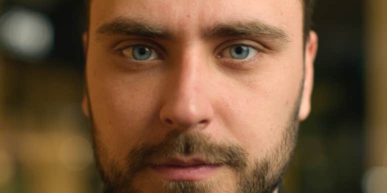 serious looking man who is likely to be a truly terrible husband