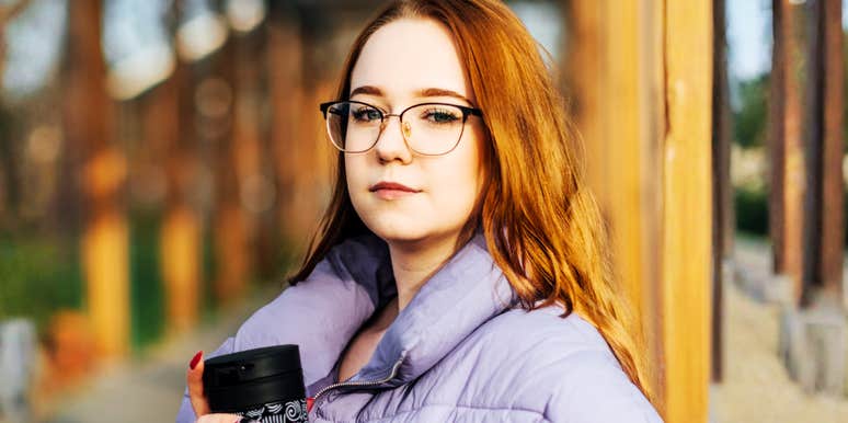 A candid, relaxed Gen Z woman outdoors, representing the shift in mindset as younger generations rethink traditional marriage and societal expectations.