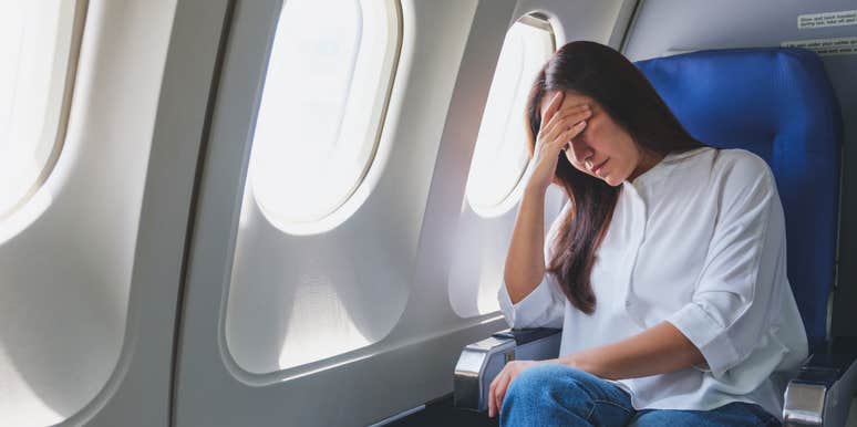 passenger upset that her flight attendant overreacted to being tapped on the arm