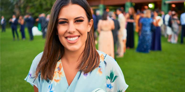happy smiling woman leaving a party without saying goodbye