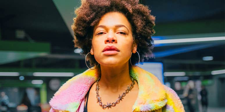 woman in colorful outfit possessing exceptionally powerful inner strength