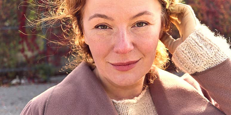 Woman over 40 looking warmly at the camera