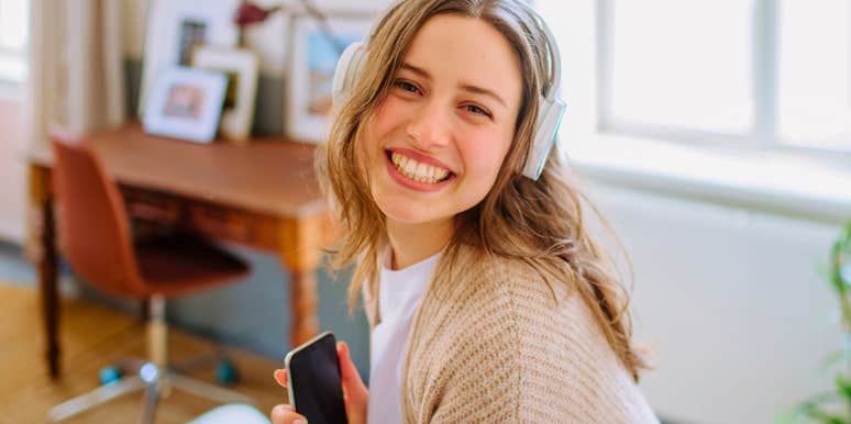 woman who prefers comfort over dressing up and being fancy relaxing at home with music