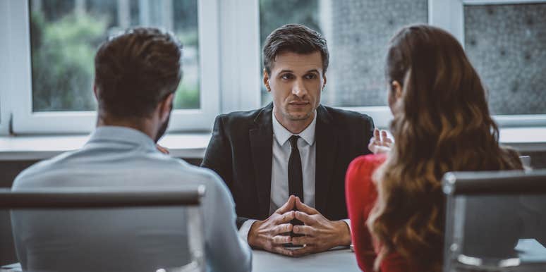 ceo sitting across from job candidates during interview