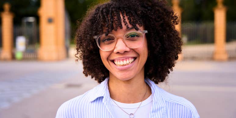 woman with adhd smiling feeling powerful and confident