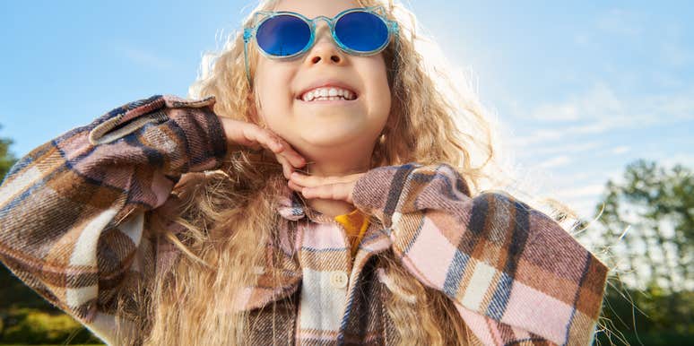 young girl looking at someone she admires