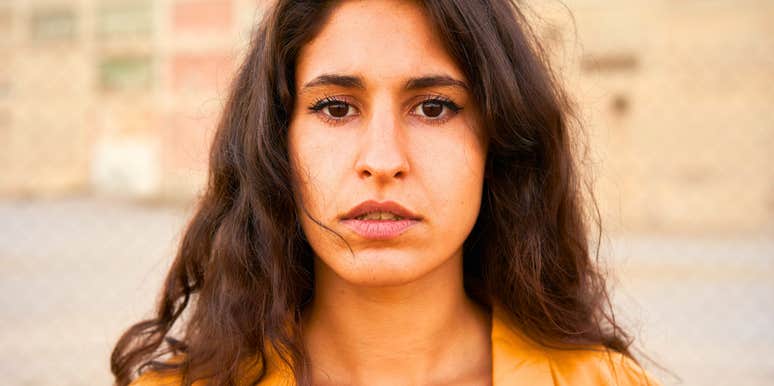 sad woman refusing to feel hateful towards her ex