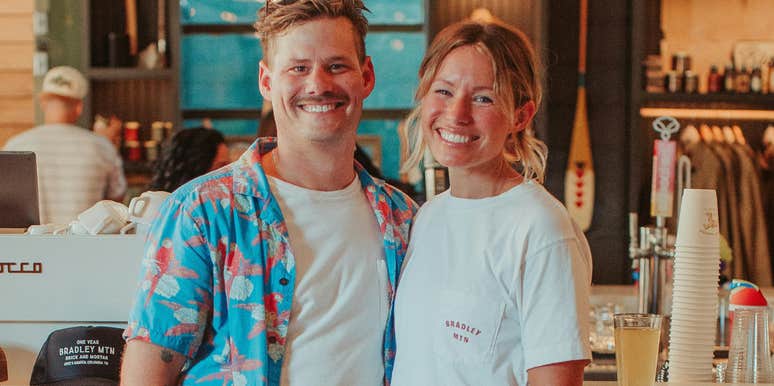 A smiling man and woman enjoying a simple outing together, representing how emotionally intelligent partners handle small moments of connection to build a stronger bond