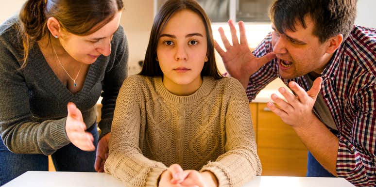 narcissistic parents yelling at their daughter at home