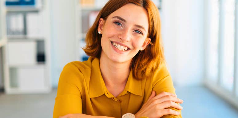 confident woman with self-worth and common sense smiling big