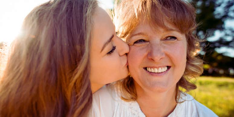middle-aged mother who loved her daughter unconditionally embraced by her adult daughter