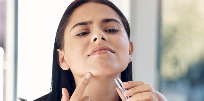 Woman finds aggressive chin hair.