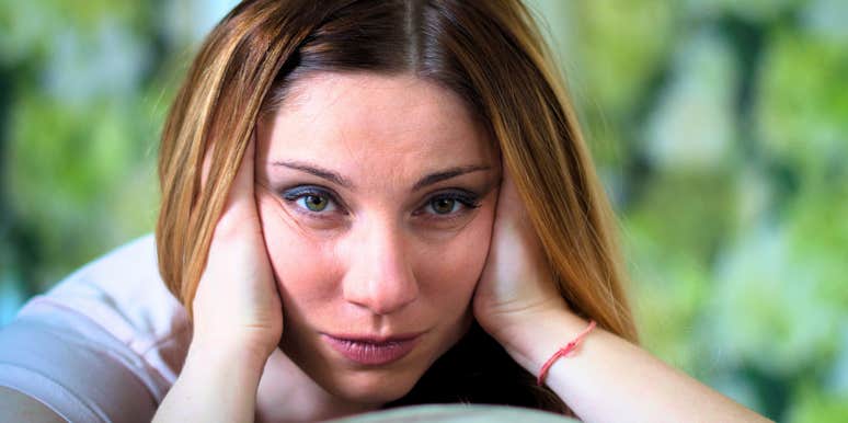 stressed woman whose body is telling her something is wrong